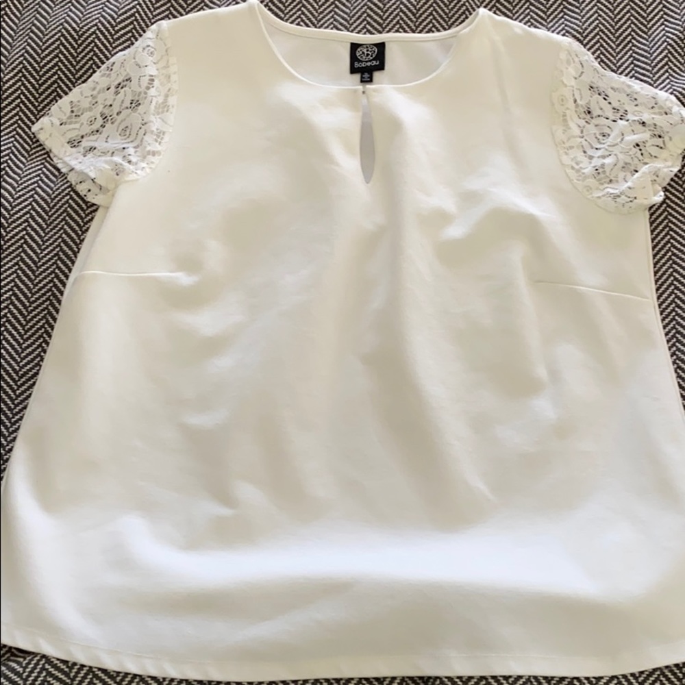 Beautiful white blouse with lace sleeve details